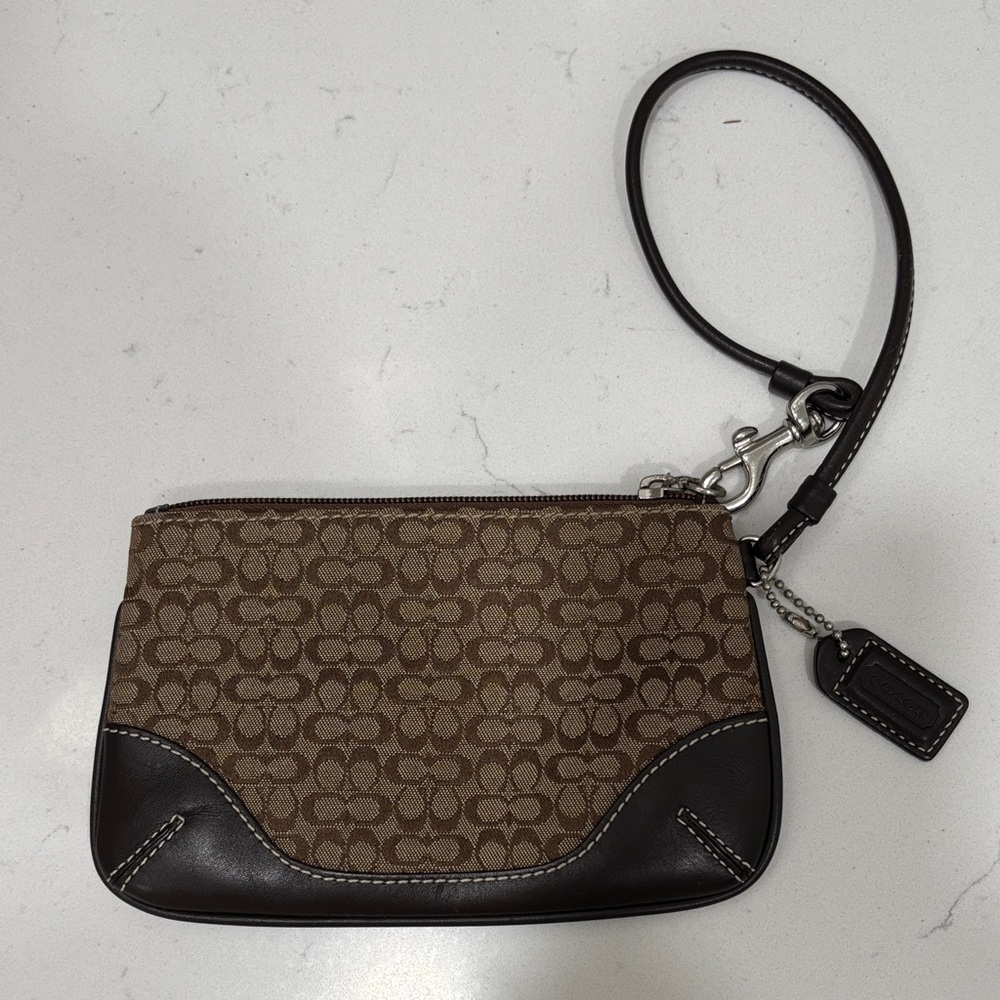 Brown Coach Wristlet with Signature Pattern